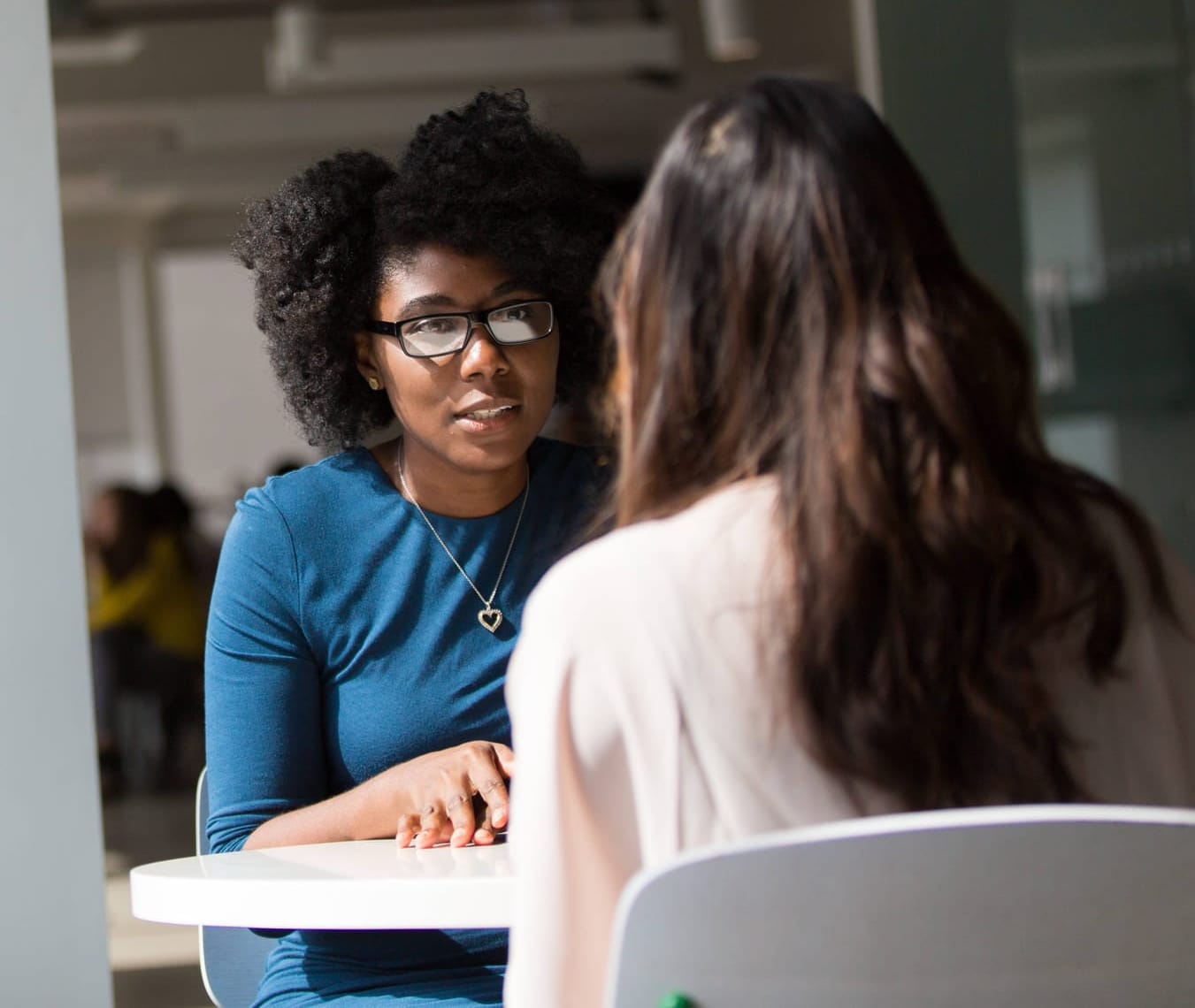 A one-on-one conversation between a team lead and a team member